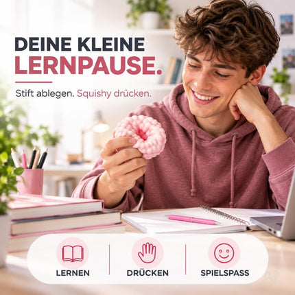 Pinker Knetball als Beschäftigung während einer Lernpause