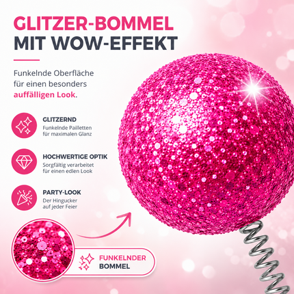 Pinker Haarreif mit wackelnden Fühlern – Nahaufnahme des Glitzerbommels